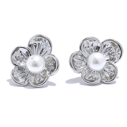 Boucle d’oreille fleur – touche de charme parisien