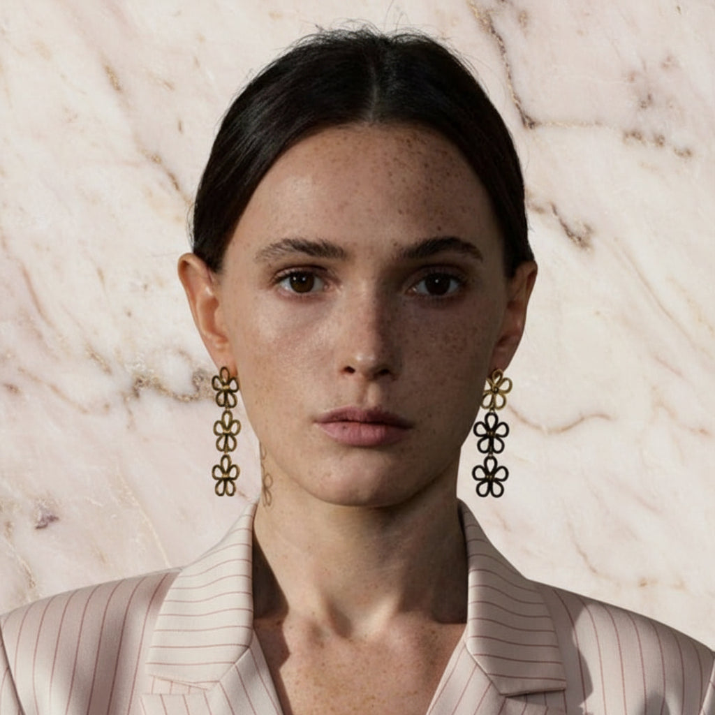 boucle d'oreille fleur en acier pour une femme elgante