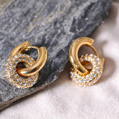 boucle d’oreille acier inoxydable dorée avec design parisien