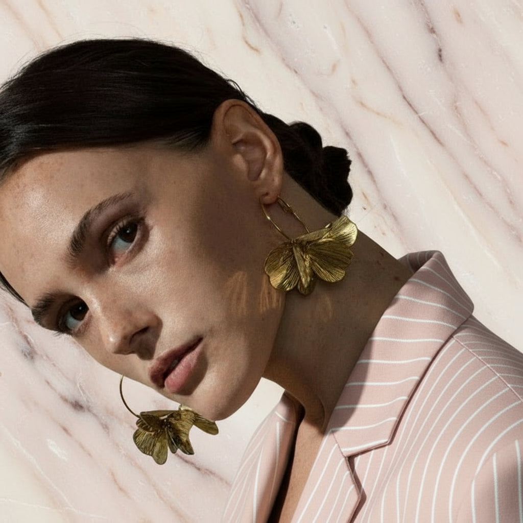 boucle d’oreille fleur attirante en acier inoxydable doré