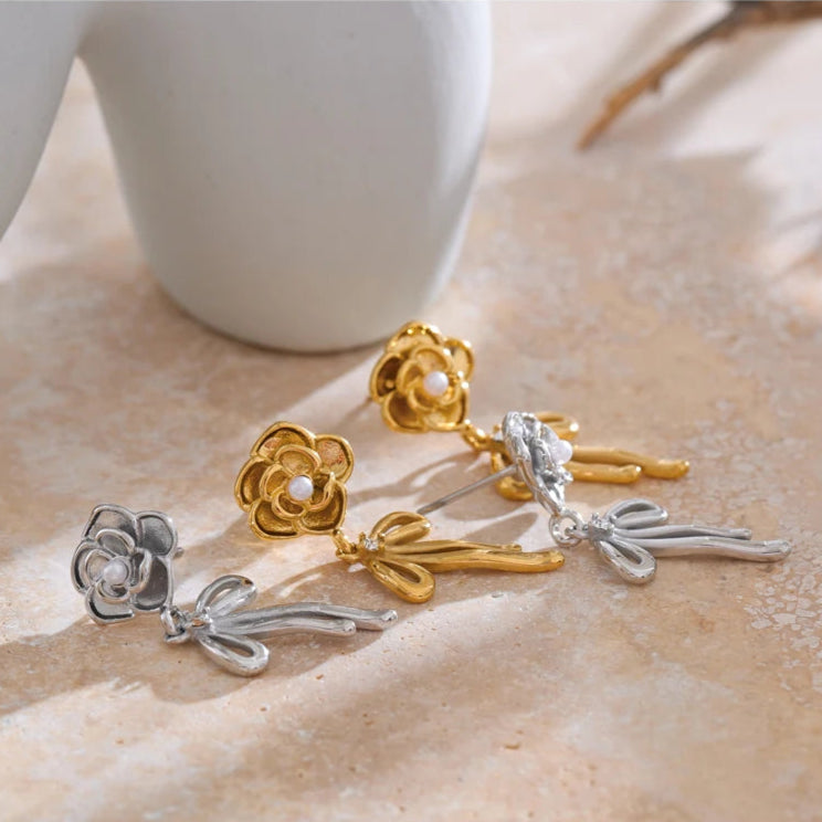 boucle d'oreille noeud acier inoxydable en deux couleurs argent et doré