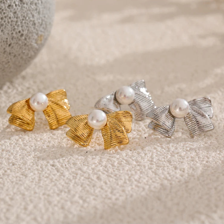 boucle d oreille noeud en platine et en doré