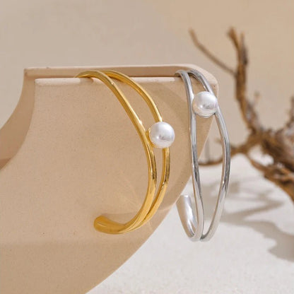 bracelet-en-jonc-perle-minimalisme-elegant-dore-argent