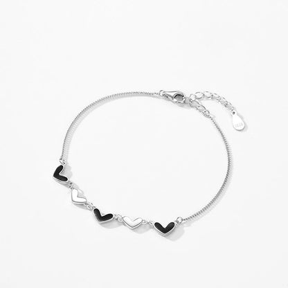 bracelet-femme-argent-coeurs-en-mail-noir-mignon