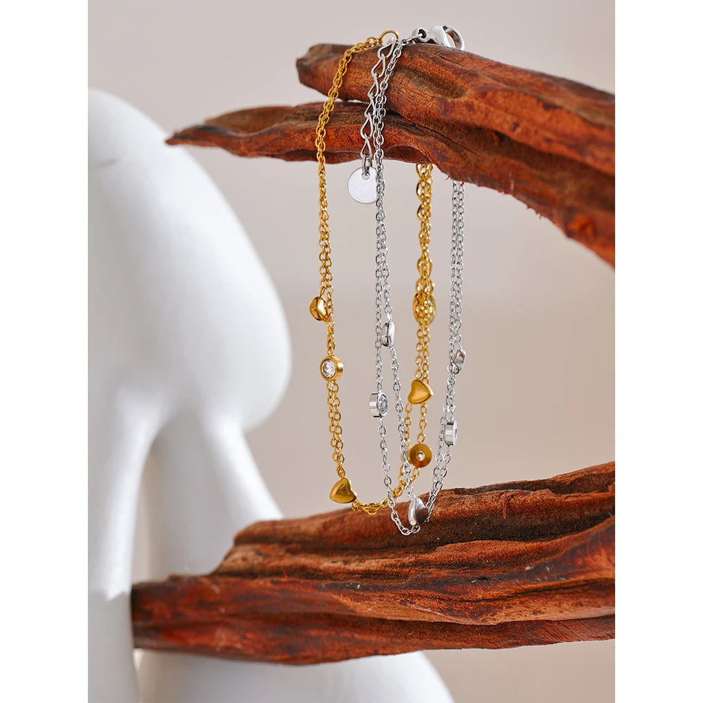 bracelet-femme-plaqué-or-double-coeur-étincelant