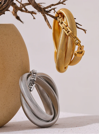 ce luxe bracelet femme tendance en acier de haute qualité elastique et audacieu disponible en argent et doré