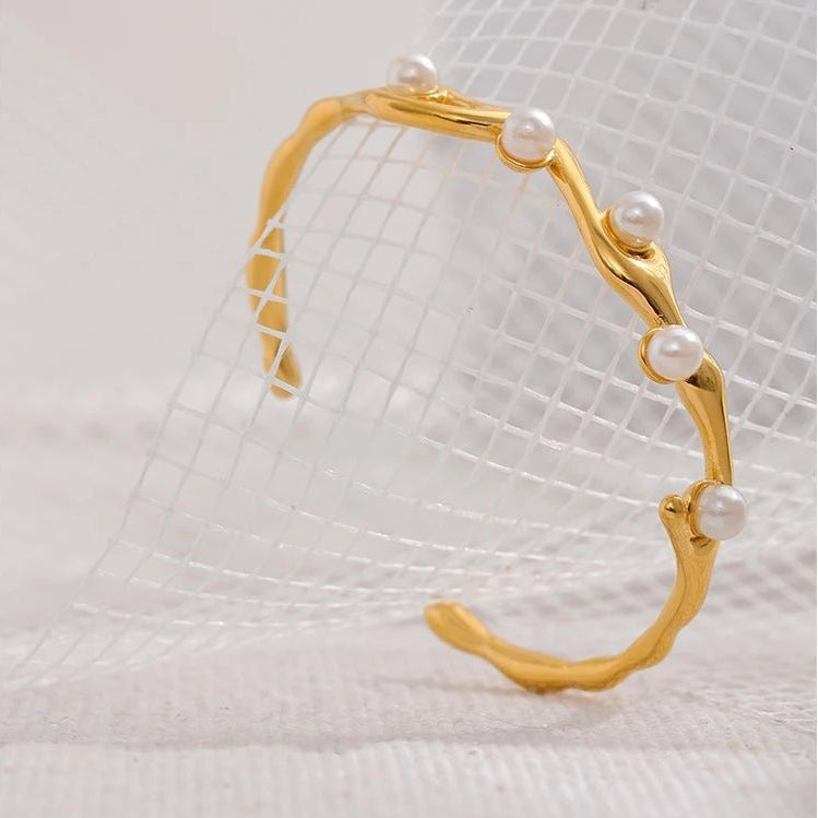 bracelet-jonc-charme-torsad-et-perles-elegantes