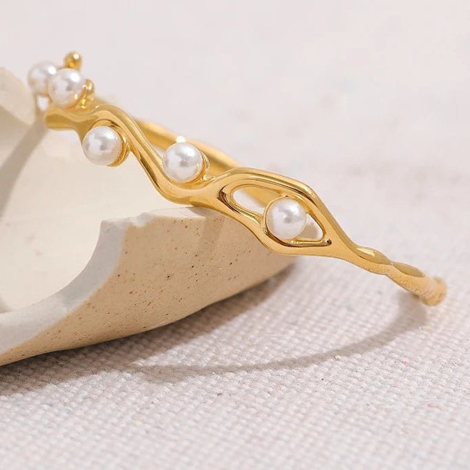 bracelet-jonc-torsad-et-perles-elegantes