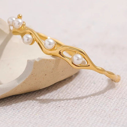 bracelet-jonc-torsad-et-perles-elegantes