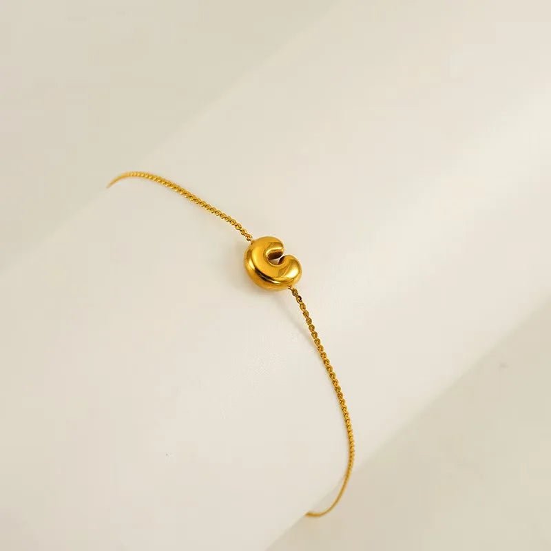 bracelet-lettre-acier-c