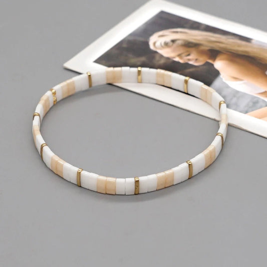 bracelet-perle-en-verre-blanc-doré