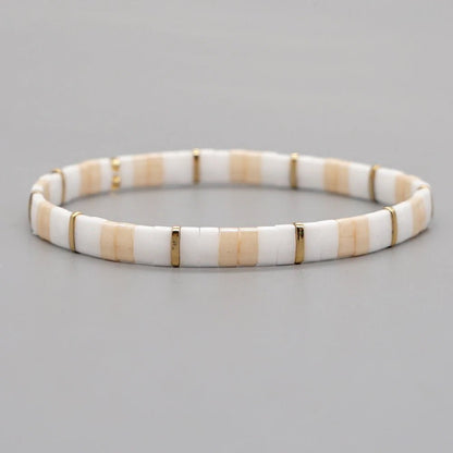bracelet-perle-en-verre-blanc-doré-femme
