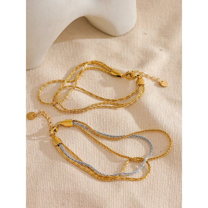 bracelet-plaque-or-femme-superposition-elegante-pour-eclat-quotidien-dore