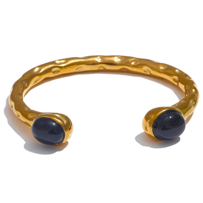  bracelet tendance du moment dore avec perle noir pour femme parisienne