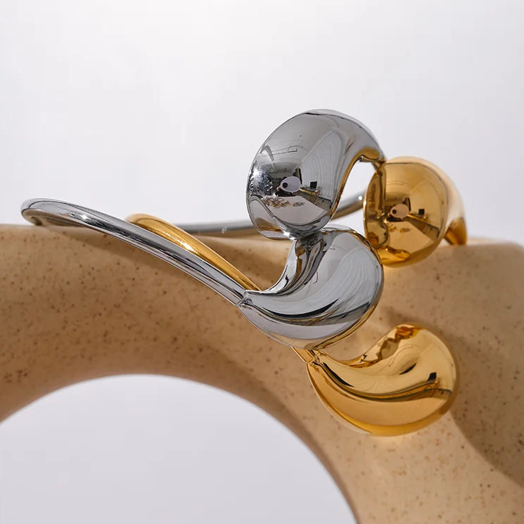 bracelet femme tendance couleur argent et doré en acier inoxydable le modele original