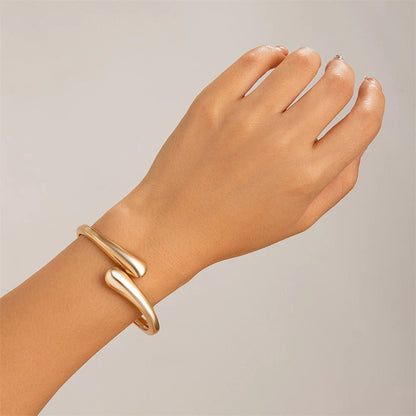 jonc-bracelet-manchette-torsadee-en-doré